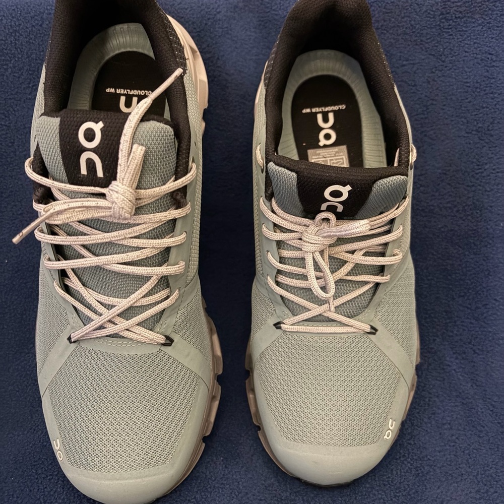 On Running Athletic Shoes in sea/ Glacier